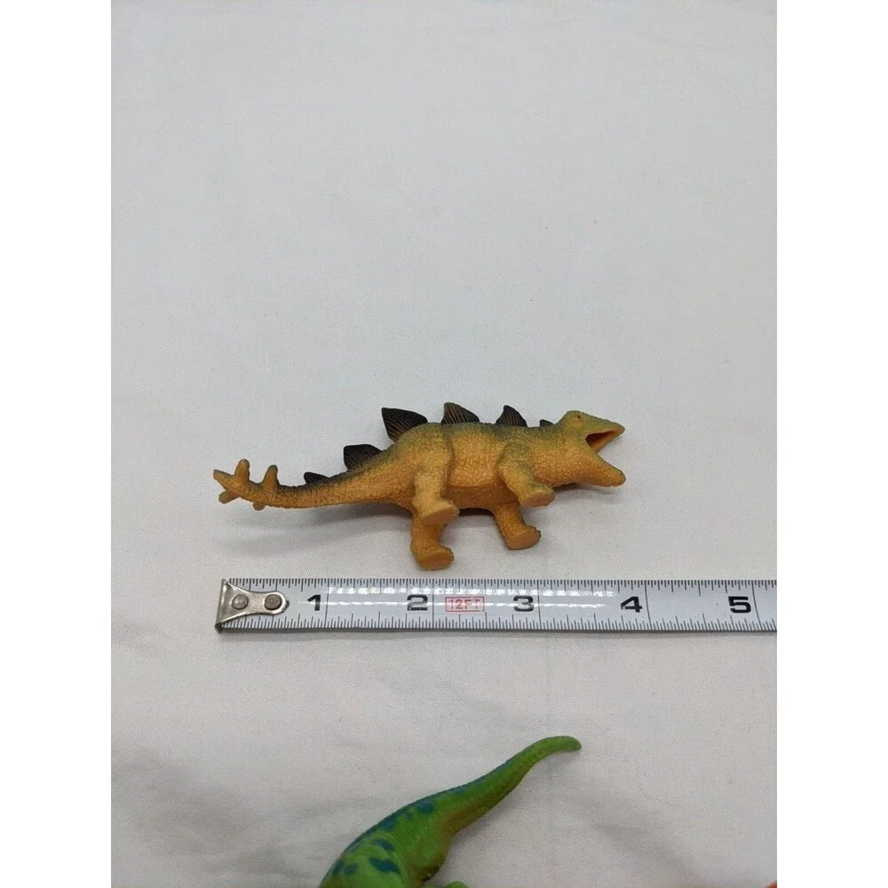 Lot Of (7) Dinosaur Toys Trex Stegasaurs Triceratops